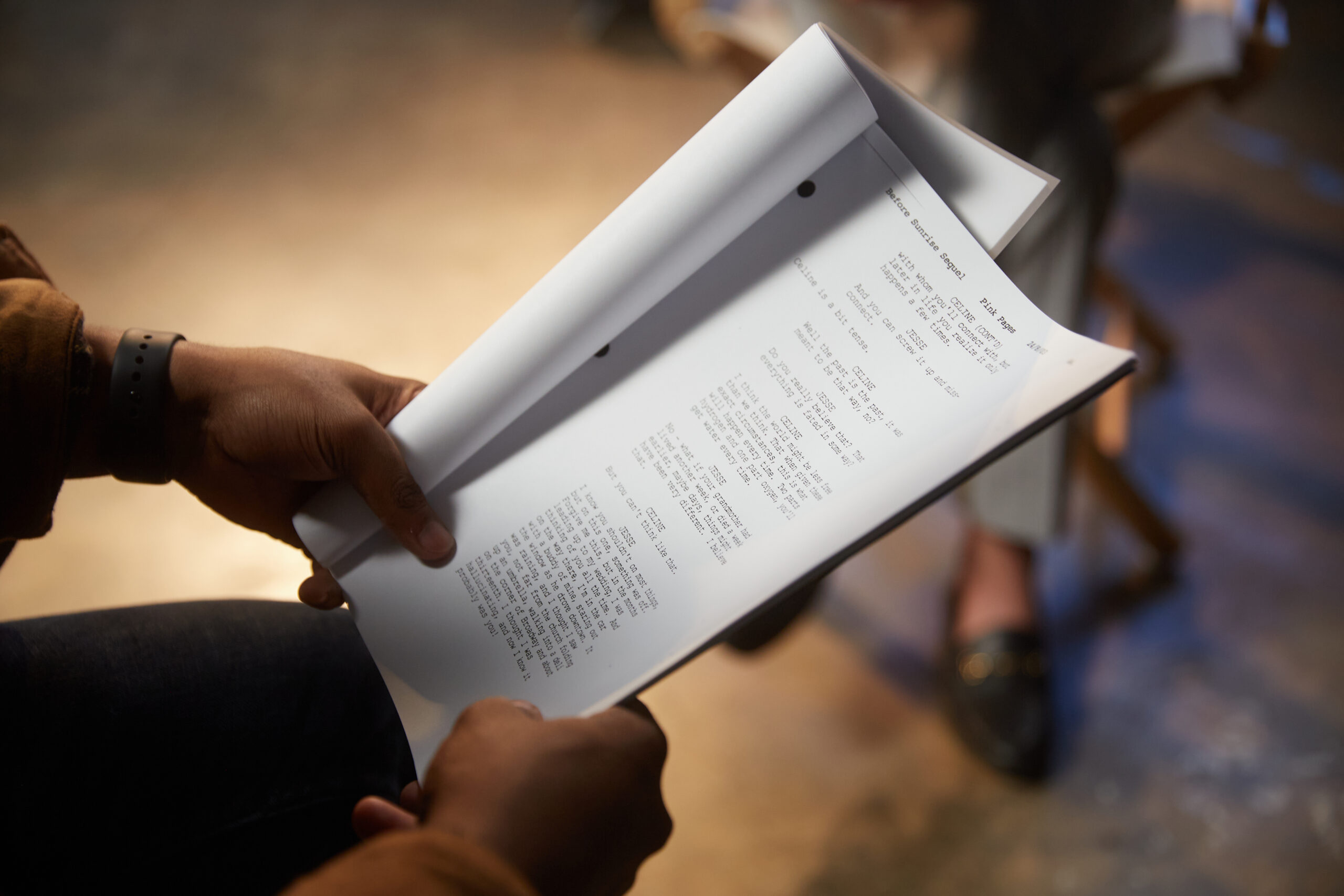 A script being held by a performer